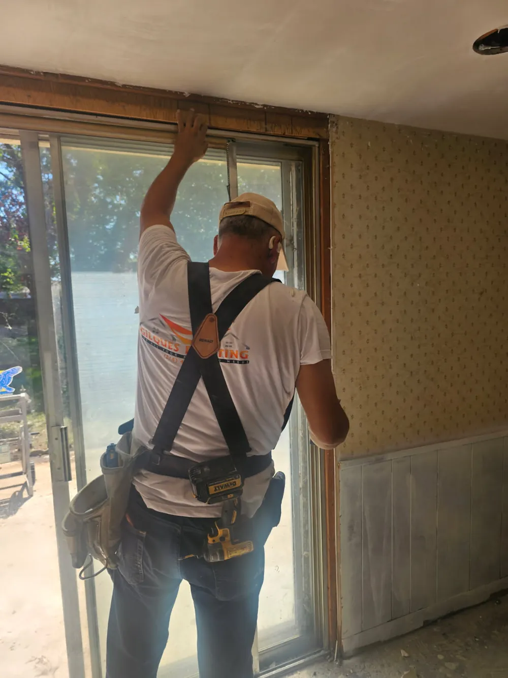 Gilques installing a sliding patio door