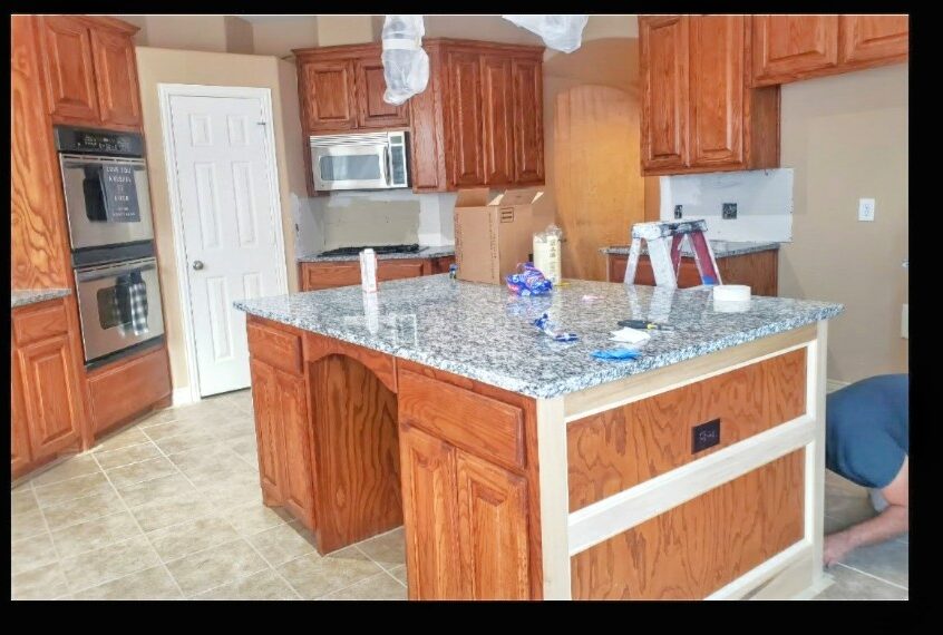 Finished kitchen with painted cabinets by Gilques Painting
