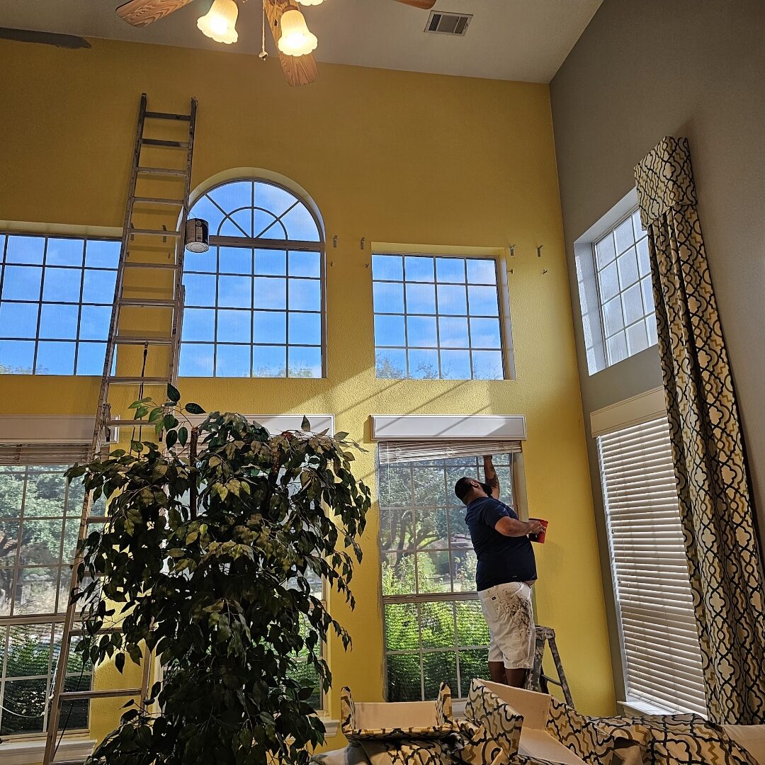 Two-story foyer with chandelier — Gilques Painting interior repaint